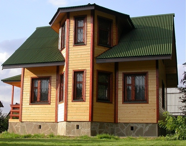 Дома из бруса с эркером: особенности постройки